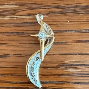 Elegant Gold and Silver Pendant